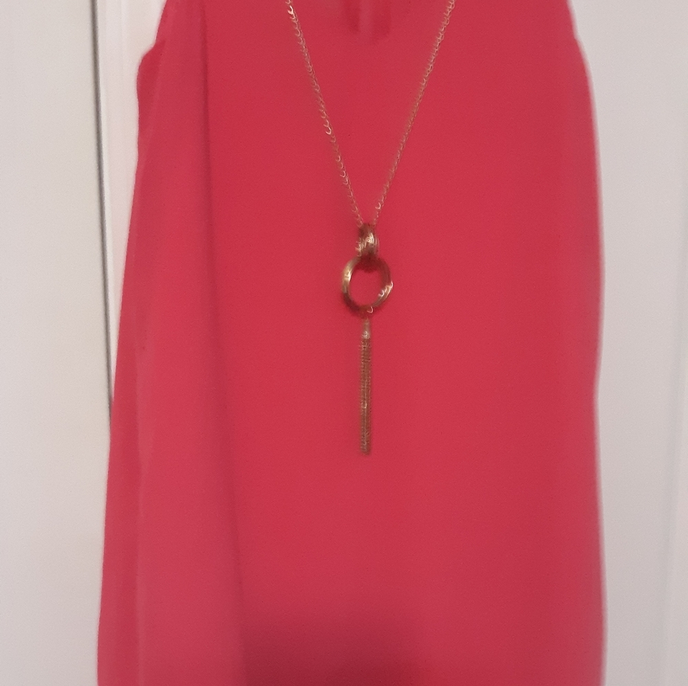IN dress with necklace flare fit open back